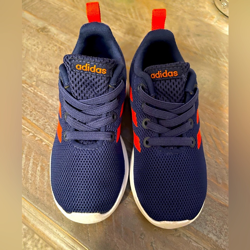 Adidas toddler size 7 tennis shoes. In excellent condition. Navy and red.